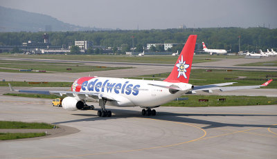 Eldewiss A-330 is being towed away from the terminal
