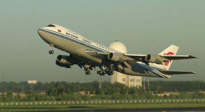 Air China 747, with PEK radar in the background