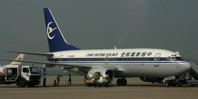 XinJiang Airline, from the northwest region of China, being tended at SHA