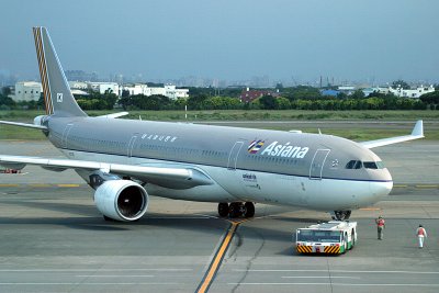 Asiana A-330-300 being pushed back at TPE, Aug 2008