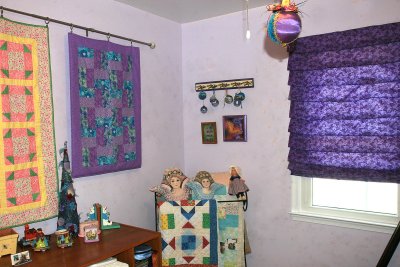 I finally finished my re-do of the computer room, including a hobbled roman shade I made at a G Street Fabrics class