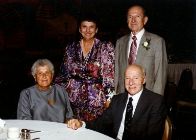 Janet with sister Martha, her husband Mike, and Harry.