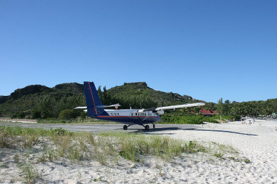 If a pilot doesn't stop quickly enough, he/she ends up on St. Jean beach!  Nothing keeps beachgoers off the runway here.