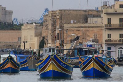 Memorable because of the interesting bus ride to town (Marsaxlokk), colorful  fishing boats, & typical Malta walls/bldgs