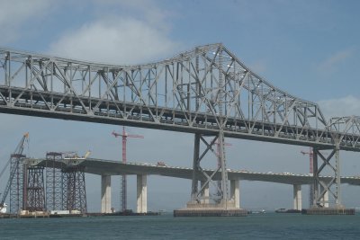 The new bridge (stopped by Schwarzenegger) and the old Bay Bridge