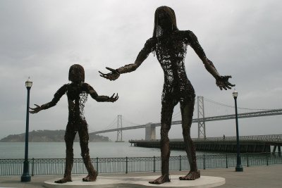 Two ladies and a bridge on a gray SF day