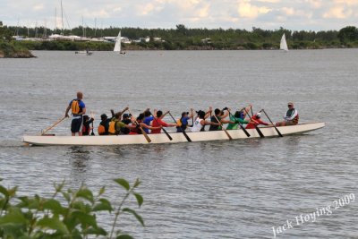 A Dragon Boat team training on a Lake Ontario Bay