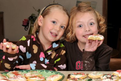 Macey & Ellie helping Grandma make Christmas Cookies