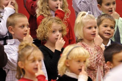 1st graders sing about Rudolph's Nose