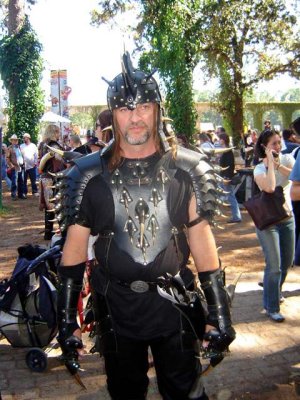 Griffin takes a moment from his shop to terrorize the faire