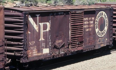 NP 8382 Dreadnaught ends and overhanging diagonal panels roof.