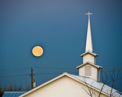 Moon setting over the formal White Chaple United Methodist Church