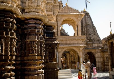 families stroll among temples