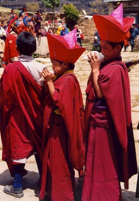 Young Monks with Seashells