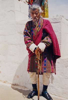 Bhutan man with beads