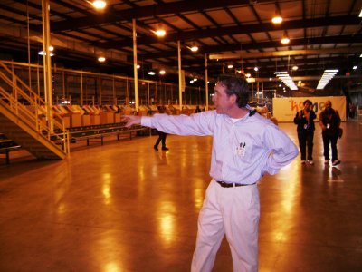 Another gentlemen further down explaining more about the shipping process.