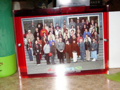 Our last night before leaving, each of us got a copy of the picture taken of our tour bus group that went thru the Hemingway plant. Only our 5x7 copy was set inside 2 sheets of acrylic, the front side clear and the back side red. Wow!!! What a trip momento they gave us!!
I hope you enjoyed seeing my trip's photos and if you were on this trip along with me, I hope you enjoyed it even 1/2 as much as I did! Love to all out there in Tupperware!!! Lisa :)