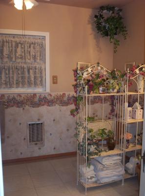Previous remodeling we did. It always made me feel warm and welcome whenever I walked into it. We added the shelving as a privacy wall for whoever happens to be sitting on the toilet (which is in the corner behind the shelves).