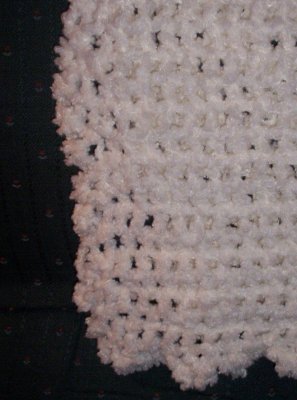 Close-up.  It was folded in 1/2 and laid across the back of the couch so this photo shows 2 layers on top of each other.