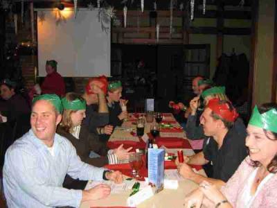 Everyone wearing their Christmas Cracker hats