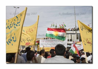 Kurdish flag between the yellow