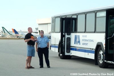 2009 - Tri-Star Bob Patterson and Airport Attendant Al Cata on the annual photographers tour at MIA, photo #1489