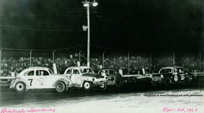 1967 - Ron Baker, #7, racing a mini stock car at Hialeah Speedway