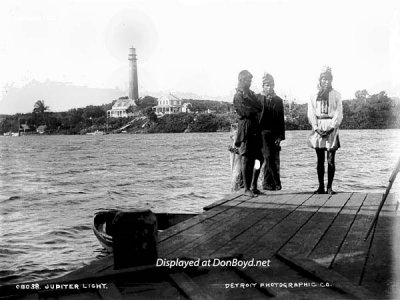 1887 - Seminole Indians at Jupiter Inlet with Jupiter Light in the background