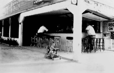 1942 - Kenny Zink in front of his dad's bar, the Grove Inn, at 1480 NW 27 Avenue, Miami