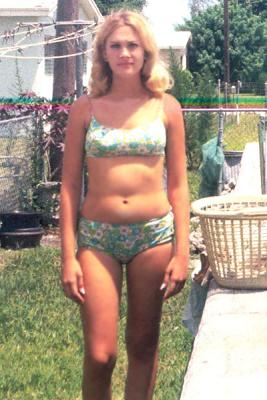 Mid 1960's - Jacqueline Jackie Zimmerman in her family's backyard next to the pool