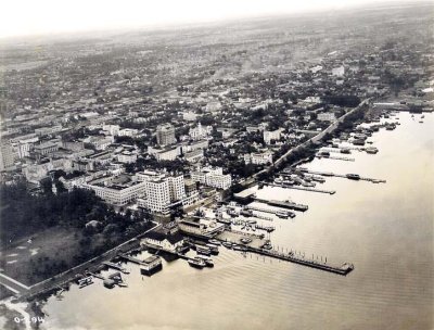 1920 - Aerial view of downtown Miami with new McAllister Hotel, before Bayfront Park was filled in