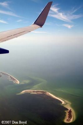 2007 - aerial view of Grassy Key and Hog Island, Florida, on the left side, un-named island on the right