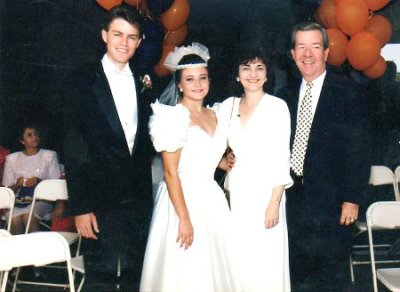 Glenn and Patti Hertrich (left) at their wedding with Fran and George Young (right)