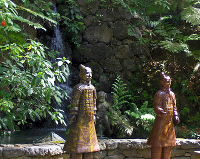 JAPANESE FIGURES BY A POOL