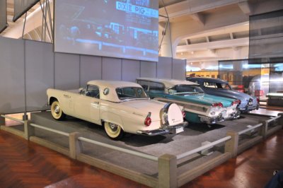 A 1956 Ford Thunderbird, an Edsel and a Studebaker at a drive-in theater.