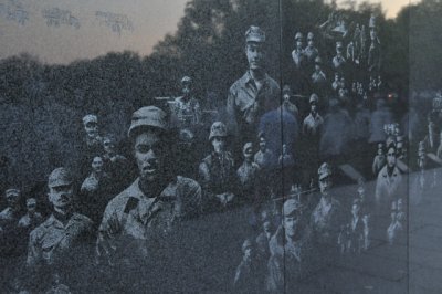 Some of the faces etched on the wall of the Korean War Veterans Memorial. Louis Nelson designed the mural.