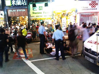 Some protesters were trying to form a human barricade.