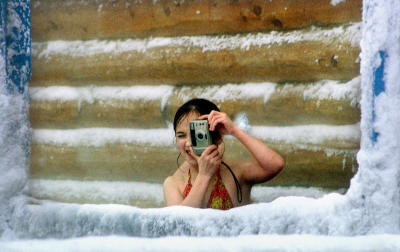 Young Siberian photographer (Hot springs near lake Baikal)