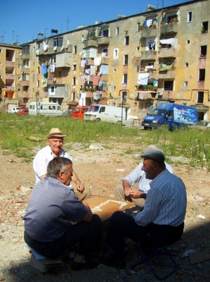 old men playing dominos
