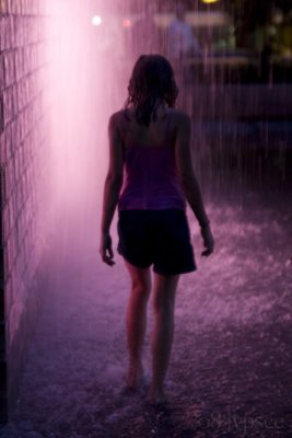 girl in pink fountain light