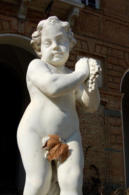 Whitish  putto  with leaf