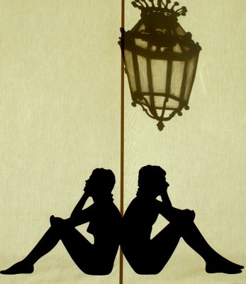 A man a woman and a streetlight