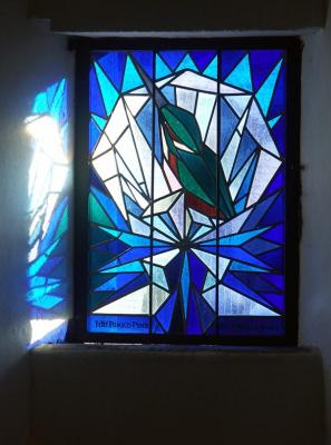 Coloured window in the Karlov Bridge Tower