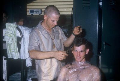 Doris Richie giving haircut (was civilian barber)