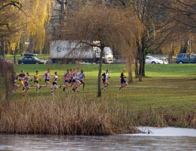 Leaders running past frozen pond