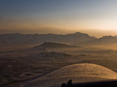 Sunrise over Kabul, turning to gain altitude