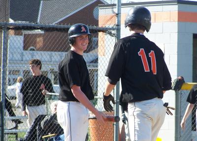 #11 justin h. crosses the plate