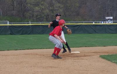 justin h. holds the runner on second