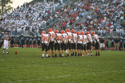 ahs kickoff team in front of a large hilliard darby crowd