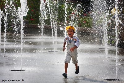 Kid at fountain
